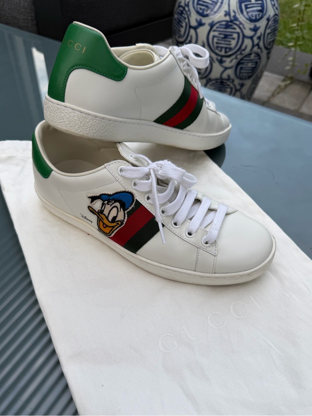Gucci womenâs White Leather Sneakers with Green Heel and Red-Green Web Stripe
